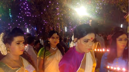 Men enter this temple, dressed as women