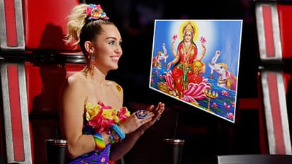In Pics: Singer Miley Cyrus performs Lakshmi Puja