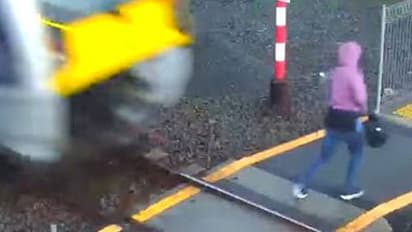 ട്രെയിന്റെ മുന്നില് നിന്നും തലനാരിഴയ്ക്ക് രക്ഷപ്പെടുന്ന യുവതി