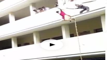 కాపీ కొడుతుంటే పట్టుకున్నారని.. బిల్డింగ్ పైనుంచి దూకేసింది