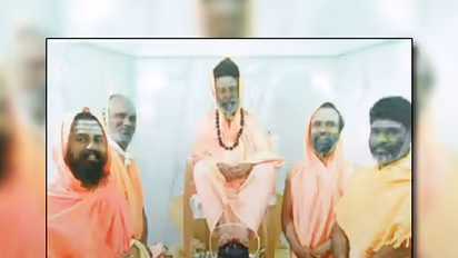 Seer places his feet on Linga, devotees fume with anger
