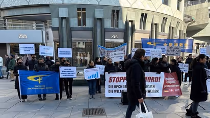 Chinese diaspora in Austria holds protest against ongoing religious persecution in China (Photo/ANI)