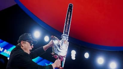 Elon Musk's Chainsaw image (Photo/Reuters)