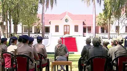 PM Modi with Gir National Park ground staff (Photo/Doordarshan)