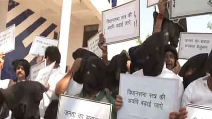 Congress leader staging protest (Photo/ANI)