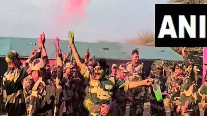 BSF personnels celebrating Holi at Indo-Pak border (Photo/ANI)