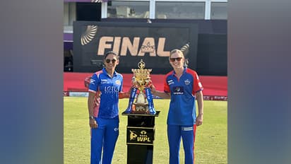 MI captain Harmanpreet Kaur and DC captain Lanning with the WPL trophy. (Photo- Delhi Capitals)