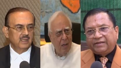 Kapil Sibal (Centre) flanked by senior advocates Adish Aggarwala (right) and Vikas Singh (Photo/ANI)