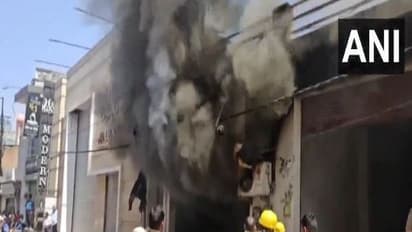 Fire tenders deployed at a showroom in Pilibhit’s Sarafa Market (Photo/ANI)