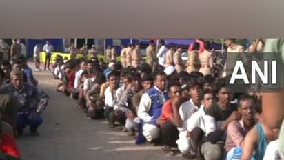 Security officials detain illegal immigrants during a statewide operation in Gujarat (Photo/ANI)