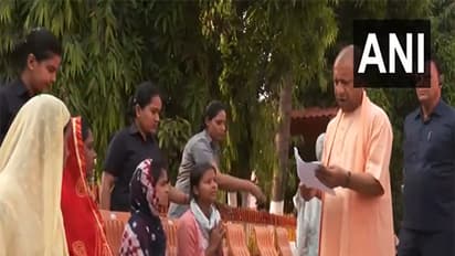 CM Yogi interacting with the public (Photo/ ANI)