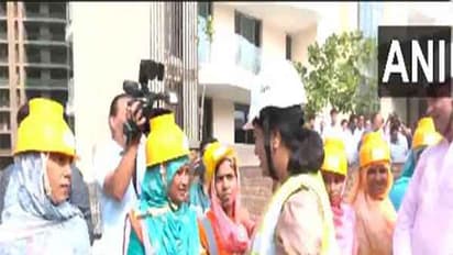 Delhi CM Rekha Gupta interacts with women workers on Labour Day (Photo/ANI)