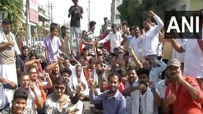 Protestors outside the St. Mary’s School exam centre (Photo/ANI)