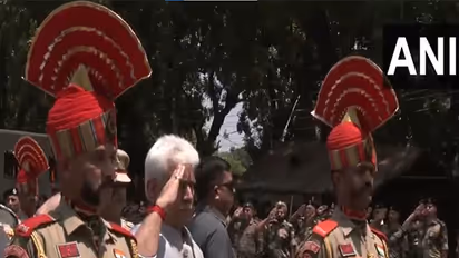 J-K Lt Governor Manoj Sinha pays last respects to BSF constable Deepak Chingakham (Photo: ANI)