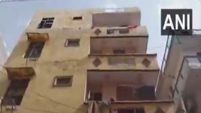 Occupants of 4-storey building in Bihari Colony vacated after finding it tilted (Photo/ANI)