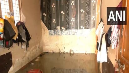 Heavy rainfall lashed several parts of Bengaluru, causing severe waterlogging and flooding in residential areas. (Photo/ANI)