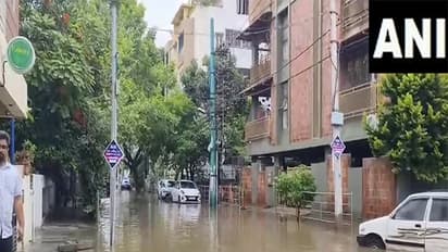 Visuals of rain inundating BTM Layout in Bengaluru (Photo/ANI)