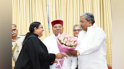 Justice Sudha Perugu with CM Siddaramaiah (Photo/ANI)