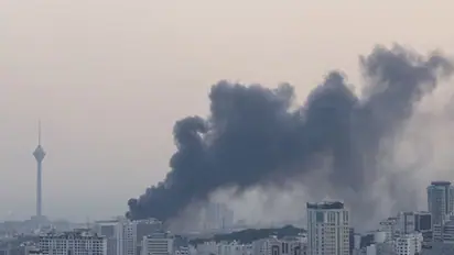 Smoke rises following an Israeli attack on the IRIB building, the country's state broadcaster, in Tehran (Image/Reuters)