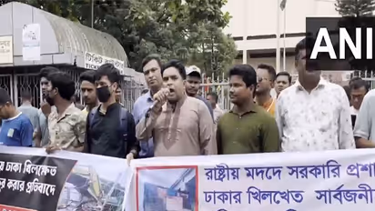 Minority groups formed human chain in Shahbagh to hold protest against Durga Temple demolition (Photo/ANI)