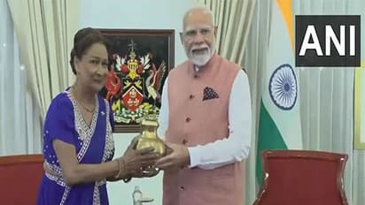 PM Narendra Modi gifts holy water of Sangam and Saryu River from Mahakumbh to Trinidad and Tobago PM Kamla Persad-Bissessar (Photo/ANI)