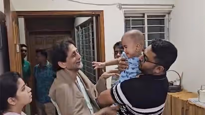 Abul Barkat bids farewell to family members after police arrest him (Photo courtesy: Arunu Barkat, daughter of Abul Barkat)