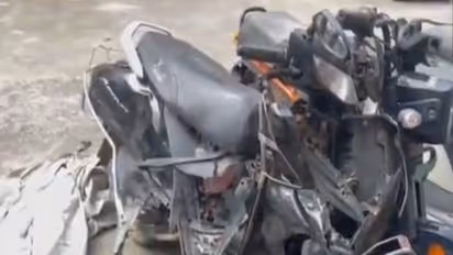 The mangled two-wheeler involved in the accident in Noida on July 26 (Photo/ANI)