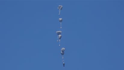 A plane airdrops humanitarian aid over Rafah in southern Gaza Strip (File Photo/Reuters)