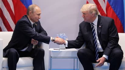 A 2017 file photo of Vladimir Putin with Donald Trump at the G20 summit in Hamburg. (File Photo/Reuters)
