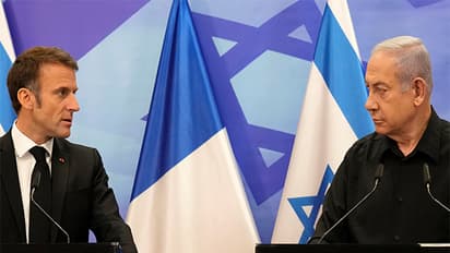 Israeli Prime Minister Benjamin Netanyahu with French President Emmanuel Macron during a joint press conference in Jerusalem (File Photo/Reuters)