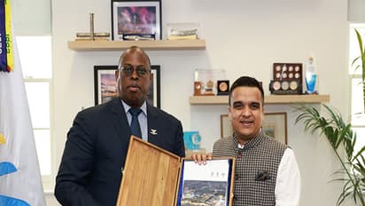 Harsh Sanghvi submitting the proposal to Dr Donald Rukare, President, Commonwealth Sport in London. (Photo: @HCI_London X)