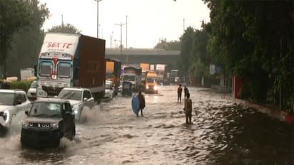 Visuals show the waterlogged roads of Delhi's Monastery Market area (Photo/ANI)
