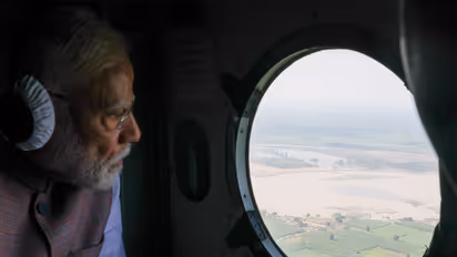 Prime Minister Narendra Modi undertaking aerial view of flood situation in Punjab (Photo/ANI)