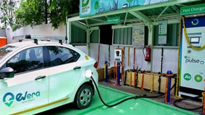 An electric vehicle charging at a station in Delhi (Photo/ANI)
