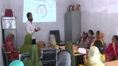 NRLM Block program manager Kamran Hanif interacts with beneficiaries in Rajouri (Photo/ANI)