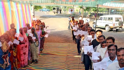 Male and Female voters standing in queues to cast their votes (File Photo/ANI) 