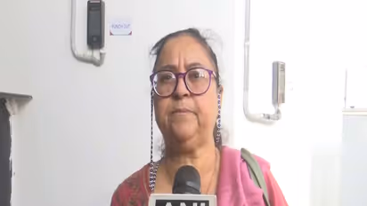 A passenger stranded at Guwahati Airport (Photo/ANI)