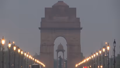 Visuals show India Gate amid wet roads following overnight showers in New Delhi (Photo/ANI)