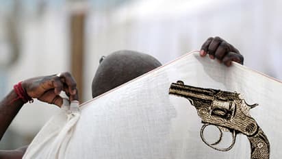 Priest from Bihar caught selling pistols, bullets in Bengaluru!