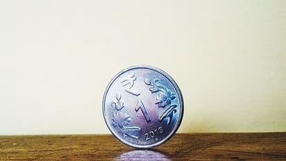 Rupee declines 20 paise to 71.47 against US Dollar in early trade