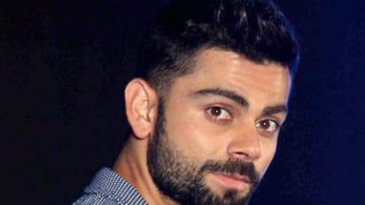 ನೋಟಿನಲ್ಲಿ ಆಟೋಗ್ರಾಫ್ ಕೊಟ್ಟ ಕೊಹ್ಲಿ