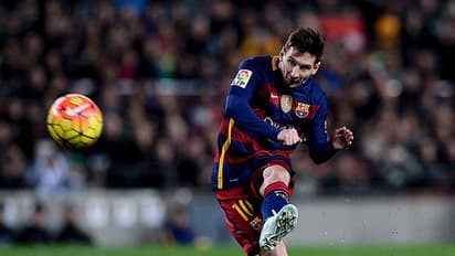 Watch: Lionel Messi scores twice to keep Barcelona in title race