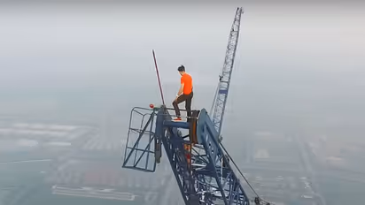 Couple scales China's tallest construction site