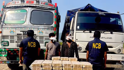 NCB, Guwahati with 53.937 kg of seized Methamphetamine/WY Tablets (Photo/NCB)