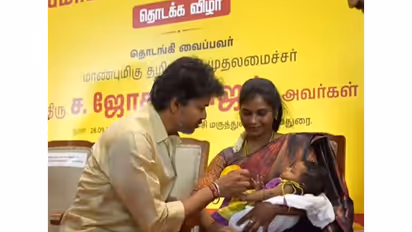 Tamil Nadu Chief Minister C. Joseph Vijay presents a Gold ring to a newborn child (Photo/TNDIPR)