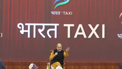 Union Home and Cooperation Minister Amit Shah interaction with Bharat Taxi drivers (photo/ANI)
