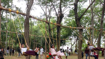 Girls swing on the occasion of 'Raja' festival in Odisha (Photo/ANI)