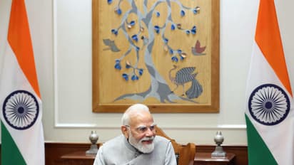 PM Modi via video conferencing speaks to the team of Skyroot Aerospace to congratulate them on the successful launch of Vikram-1 (File Photo/ANI)