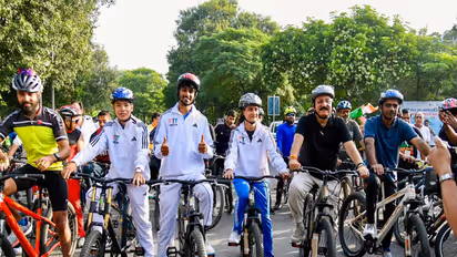 Asian Games 2026 medallists with Delhi Minister Ashish Sood during Fit India Sundays on Cycle event. (Photo: SAI Media)