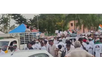 Supporters participate in a foot march from Siddaganga Mutt in Tumakuru (Photo/ANI)